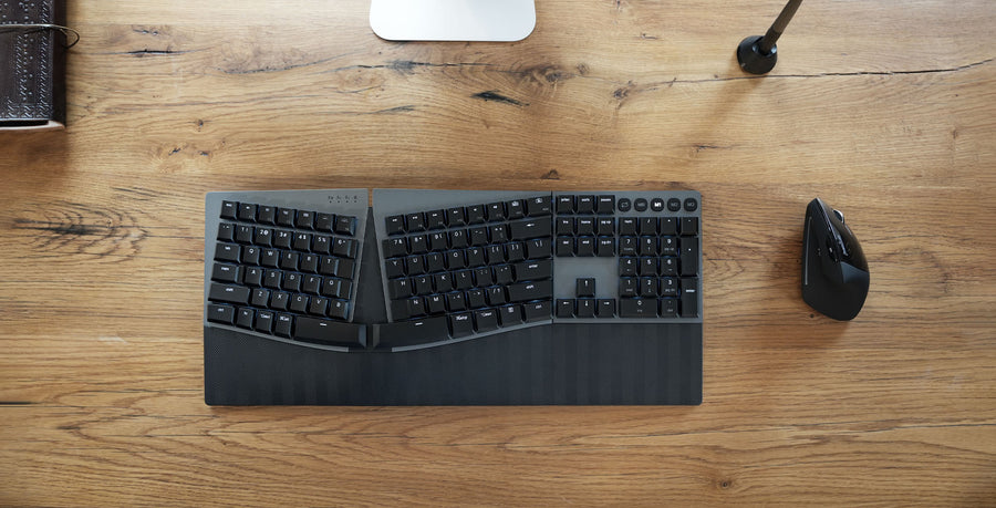 PERIBOARD-835 and PERIMICE-713 on a desk
